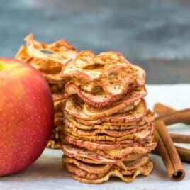 Crispy Baked Apple Chips. Simple oven recipe with just cinnamon and apples, no sugar or dehydrator needed! Easy, healthy, and so much better than store bought. Kids love them and they are great for gifts and healthy snacks. Recipe at wellplated.com