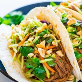 Asian pulled pork tacos made in a crock pot