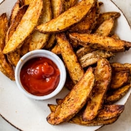 quick air fryer potato wedges on a plate