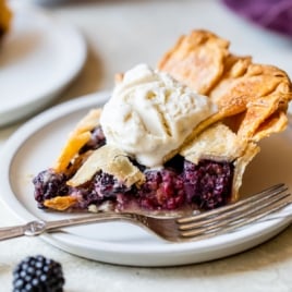 the best blackberry pie recipe on a plate