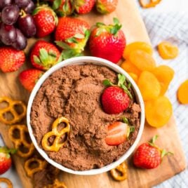 Healthy Chocolate Hummus in a bowl with pretzels and strawberries