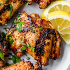 The best grilled chicken thighs on a plate