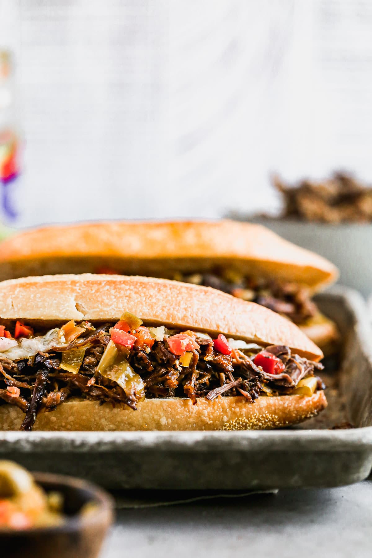 A sandwich of Italian beef with cheese