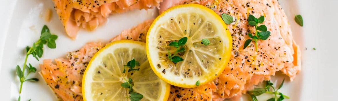 Perfectly cooked Lemon Pepper Salmon baked in the oven