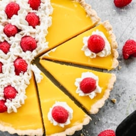 lemon tart recipe no bake topped with berries and whipped cream