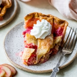 the best rhubarb pie slice on a plate