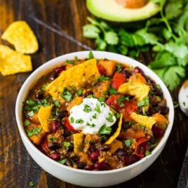Instant Pot Vegetarian Chili with Black Beans, Quinoa, and Sweet Potatoes. Easy, healthy, and filling with the perfect blend of spice. This is the BEST veggie chili recipe! Thick, not too spicy, hearty, and the pressure cooker makes the prep simple!