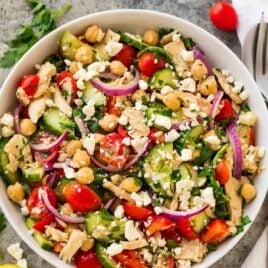 Healthy, easy Chickpea Tuna Salad. A bright, healthy meal prep salad that's perfect for healthy lunches and healthy dinners! One of our favorite vegetarian recipes. Gluten free and packed with protein and fresh veggies!