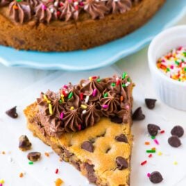 Ultra soft, ultra chewy Chocolate Chip Cookie Cake from scratch! The BEST recipe. EASY and the rich chocolate fudge frosting tastes incredible. Decorate for a special homemade birthday dessert or just enjoy a giant slice. Recipe at wellplated.com | @wellplated