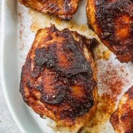 smoked chicken thighs photo with text