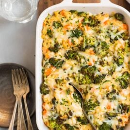 Cheesy broccoli quinoa casserole in a baking dish