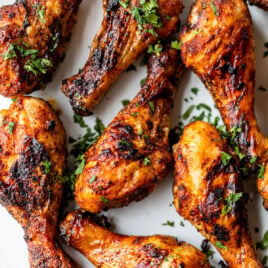 Flavorful air fryer chicken legs on a plate