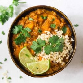 Red lentil curry with rice in a bowl