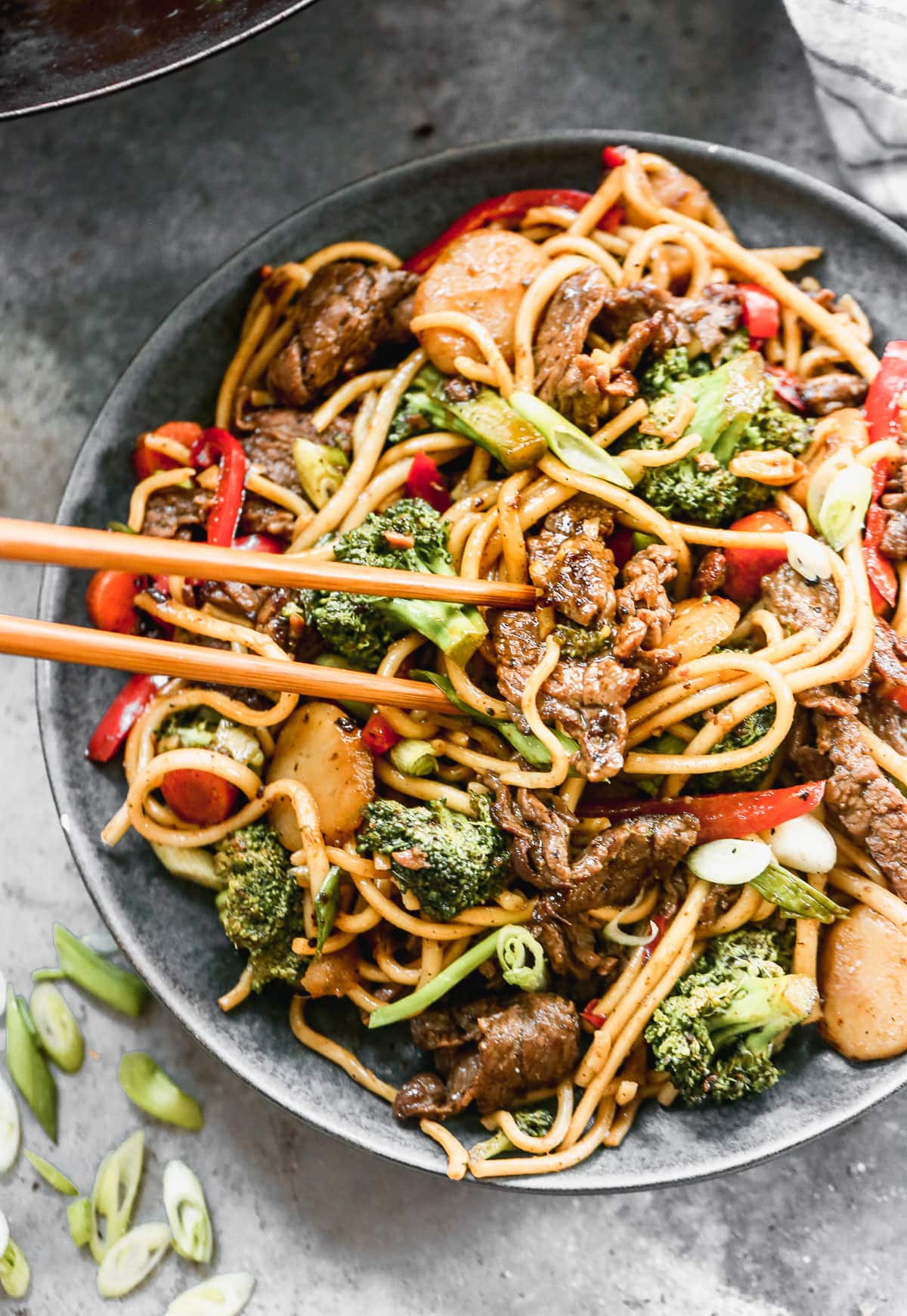beef lo mein recipe with broccoli on a plate