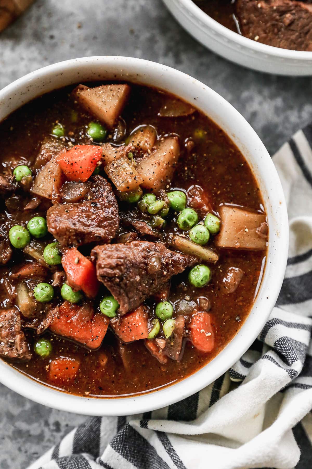 bowl of beef stew with red wine made in a slow cooker