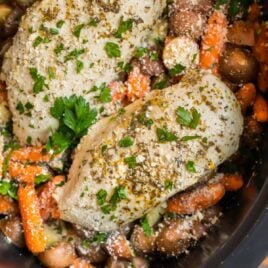 Crockpot Chicken and Potatoes and Carrots in a slow cooker with Parmesan, garlic, and herbs
