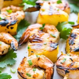 Coconut Pineapple Shrimp Skewers. The easiest, most flavorful way to cook shrimp! Juicy grilled shrimp kabobs with an irresistible citrus coconut marinade. Perfect for parties or a light summer meal. @wellplated