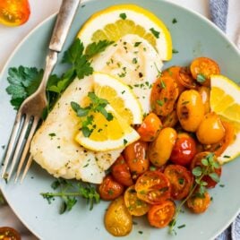 Easy pan fried cod with tomatoes and lemon