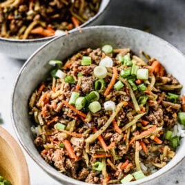 two bowls of easy egg roll in a bowl ground turkey and rice