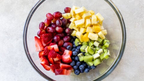 fruit salad with grapes, strawberries, pineapple, kiwi and blueberries