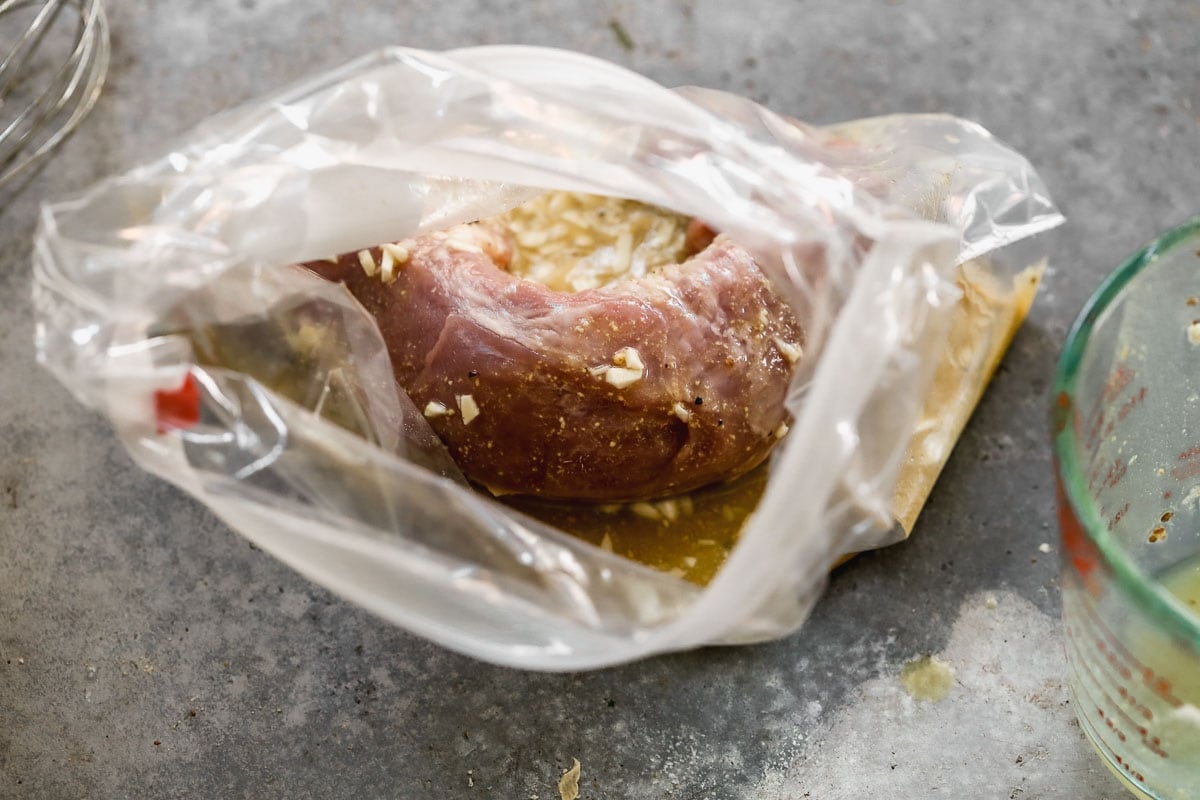 pork tenderloin marinading in a ziptop bag