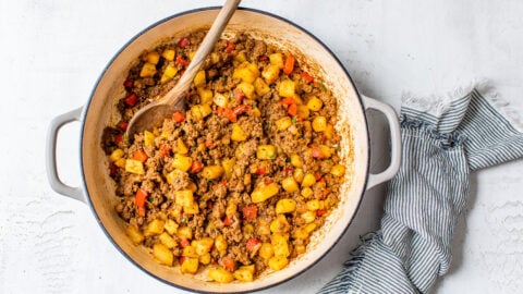 Ground beef with potatoes and peppers in a Dutch oven