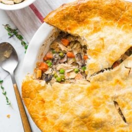 Healthy Chicken Pot Pie. Just 335 calories for a huge, creamy serving! Packed with juicy chicken, fresh veggies, and topped with a golden, flakey crust. An easy, comforting weeknight dinner! {dairy free; clean eating} Recipe at wellplated.com | @wellplated