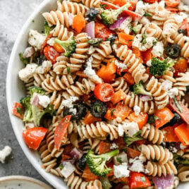 healthy Italian Pasta Salad in a bowl with pepperoni and healthy vegetables
