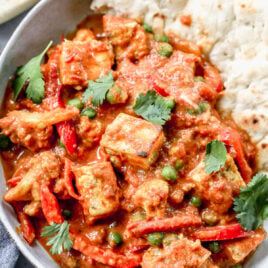 a bowl of Paneer masala restaurant style with greek yogurt and bell peppers