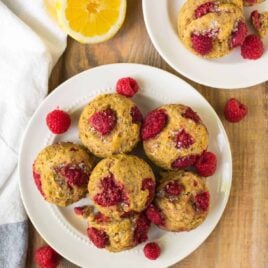 Healthy Raspberry Muffins. Moist and DELICIOUS! Easy homemade recipe for lemon raspberry muffins that are whole wheat, naturally sweetened, and made with Greek yogurt. Use fresh or frozen raspberries or swap in any of your other favorite summer fruits. Great for healthy breakfasts and healthy snacks!