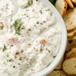 A white bowl with healthy smoked salmon dip