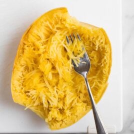 Crockpot Spaghetti Squash. How to make easy spaghetti squash in the slow cooker! Easy, healthy, and can be used with any of your favorite spaghetti squash recipes. Try it with meatballs, with sauce, and even lasagna! Vegan, low carb, keto, and gluten free.