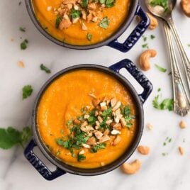 Two bowls of Instant Pot carrot soup with ginger