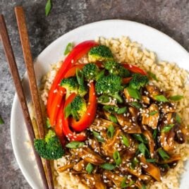 Healthy Instant Pot Teriyaki Chicken from scratch! Use fresh or frozen chicken thighs or breasts and serve with rice or cauliflower rice for a low carb version. This easy pressure cooker recipe tastes like your favorite stir fry but is so much better for you.