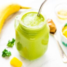Banana Kale Pineapple Smoothie — the BEST, most delicious green smoothie! Packed with protein, it keeps you full, so it’s great for weightloss or detox. Easy, healthy, and even kids love it! Recipe at wellplated.com | @wellplated
