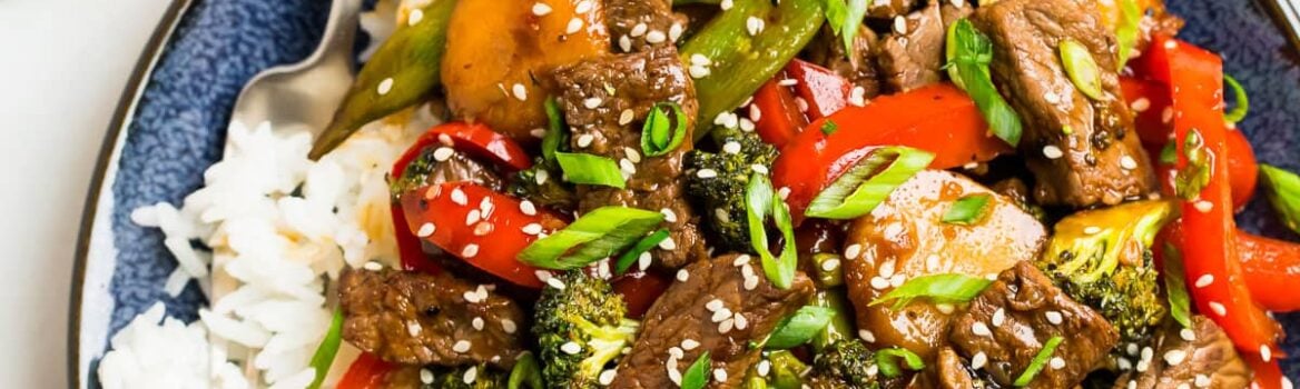 Teriyaki Beef Stir Fry topped with green onions