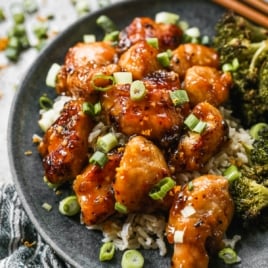 chinese orange chicken recipe on a plate with broccoli