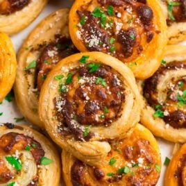 Easy Puff Pastry Pinwheel Appetizers with Pesto and Cheese