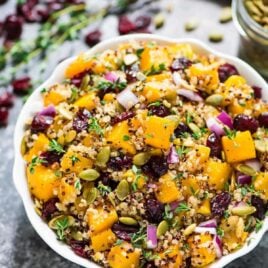Maple Butternut Squash Quinoa Salad with Cranberries. A healthy, gluten free recipe filled with fall flavors. Easy, filling and perfect for make ahead lunches and dinners! Recipe at wellplated.com | @wellplated