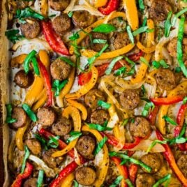 Easy Italian Sausage and Peppers in the Oven. A flavorful, healthy all-in-one dinner! Use to top sandwiches, in pasta, or serve over rice. Great for family dinners or for a crowd!