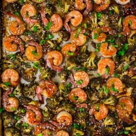 Healthy Sheet Pan Shrimp and Broccoli. Easy and DELICIOUS! Tastes like your favorite Chinese stir fry shrimp and broccoli but is so much better for you. Cooks on ONE PAN and the Chinese brown sauce is incredible. Serve with rice or quinoa for fast and healthy weeknight dinner.