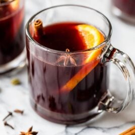 mugs of stovetop Spiced Wine with cinnamon