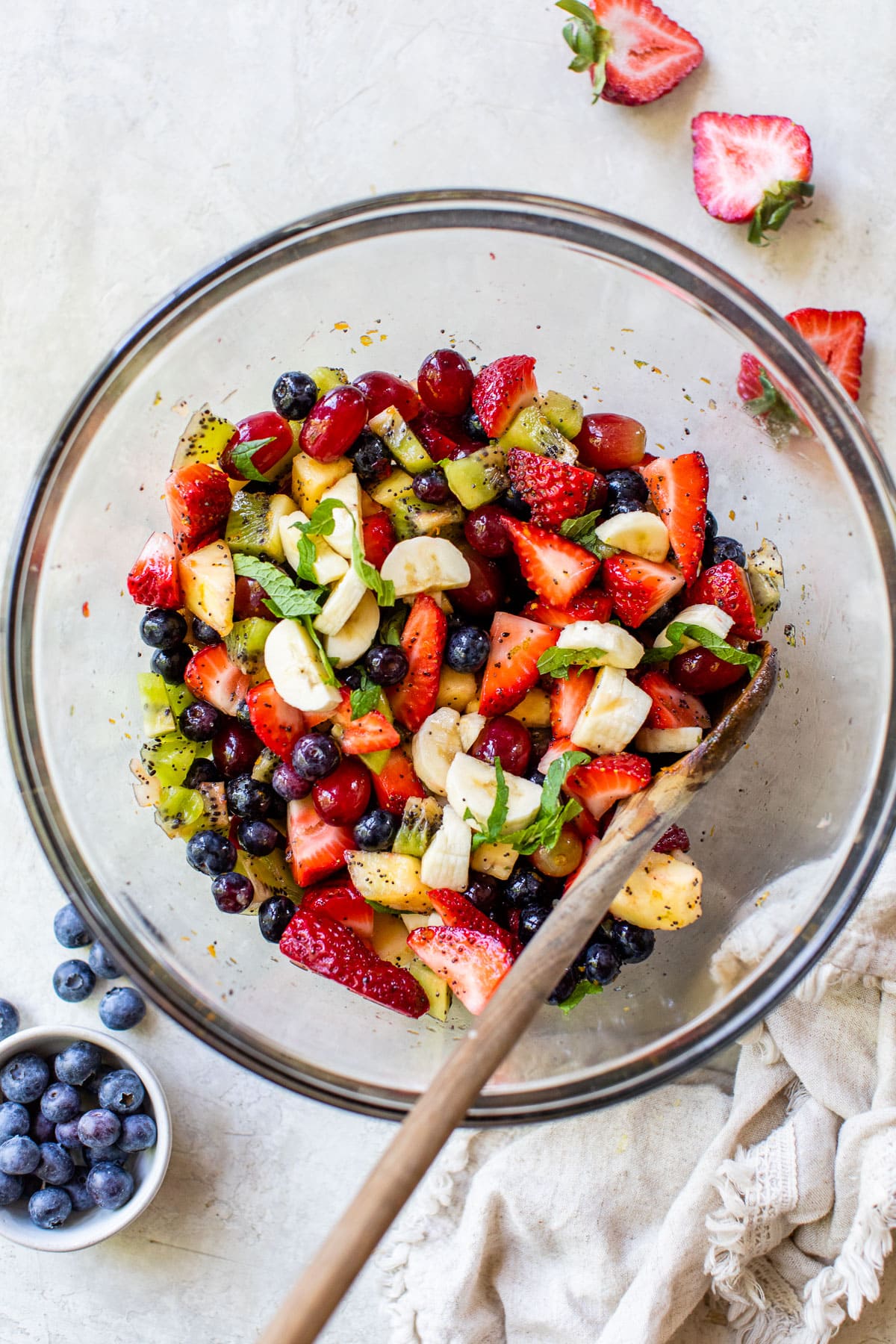 healthy fruit salad recipe with citrus dressing in a bowl