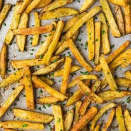 How to make Crispy Baked Oven Fries! Easy method that makes the most perfect, healthy French fries every time. Try this recipe with Garlic and Ranch or add any of your own favorite seasonings.