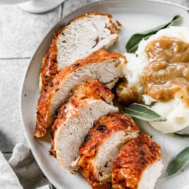 Air fryer turkey breast served on a plate with mashed potatoes