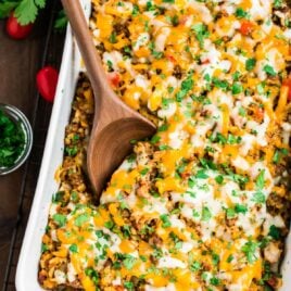 Cheesy Mexican casserole in a baking dish