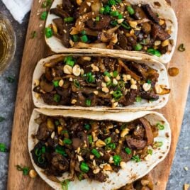 Vegetarian Mushroom Tacos. Healthy and flavorful vegan tacos made with tofu, baby bella, shiitake, or oyster mushrooms and cabbage in a sweet and spicy Asian sauce.