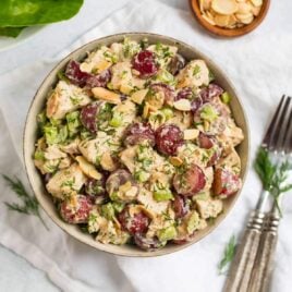 Whole30 Chicken Salad. A twist on classic waldorf chicken salad that’s Whole30 and Paleo approved! Made with grapes, almonds, celery, and an easy tahini dressing, you can use it for Whole30 chicken salad lettuce wraps, a waldorf chicken salad sandwich, or enjoy as is.