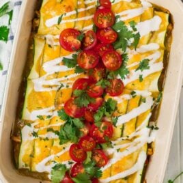 Easy Low Carb Zucchini Enchiladas with Green Sauce in a Casserole Dish